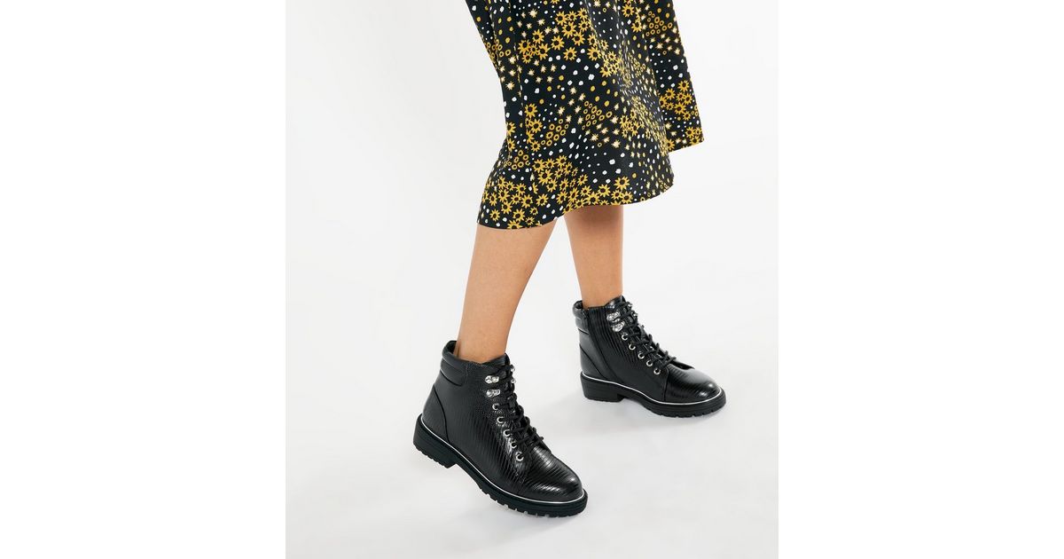 snakeskin tie up boots