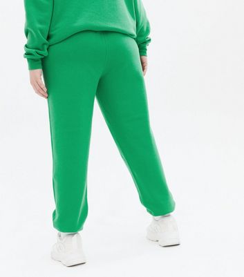 Click to view product details and reviews for Curves Green Jersey Cuffed Joggers New Look.