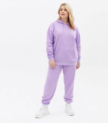 Click to view product details and reviews for Curves Lilac Jersey Cuffed Joggers New Look.