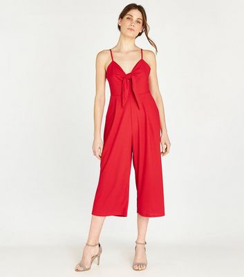 red jumpsuit cropped