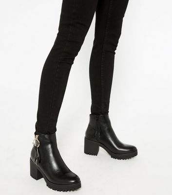 black zip heeled boots