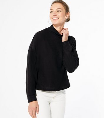 Click to view product details and reviews for Black Brushed Fine Knit High Neck Jumper New Look.