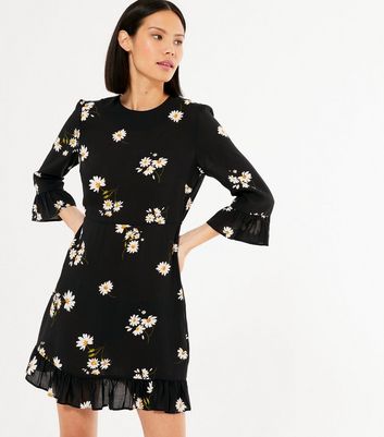 black daisy print frill tea dress