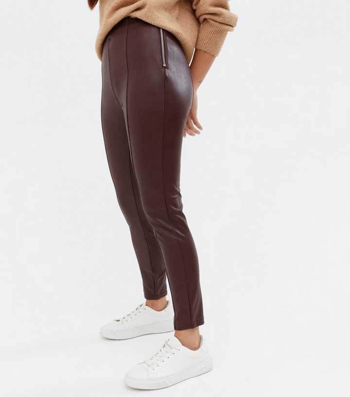 https://media3.newlookassets.com/i/newlook/668799367M1/womens/clothing/leggings/petite-burgundy-coated-leather-look-zip-leggings.jpg?strip=true&qlt=50&w=720