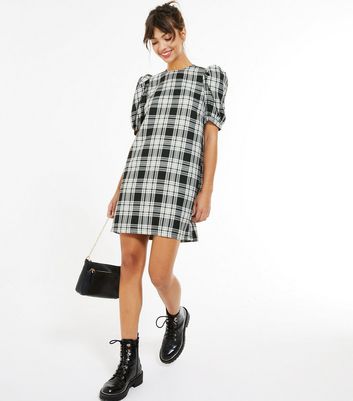 black tunic dress with sleeves