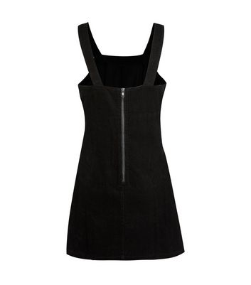 Primark store black pinafore