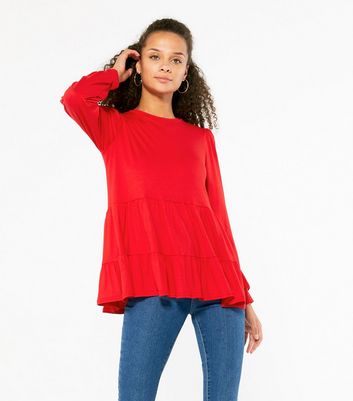 Red long store sleeve peplum top