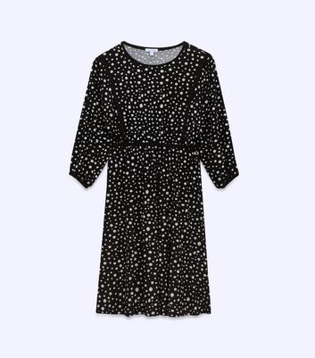 blue dress with black spots