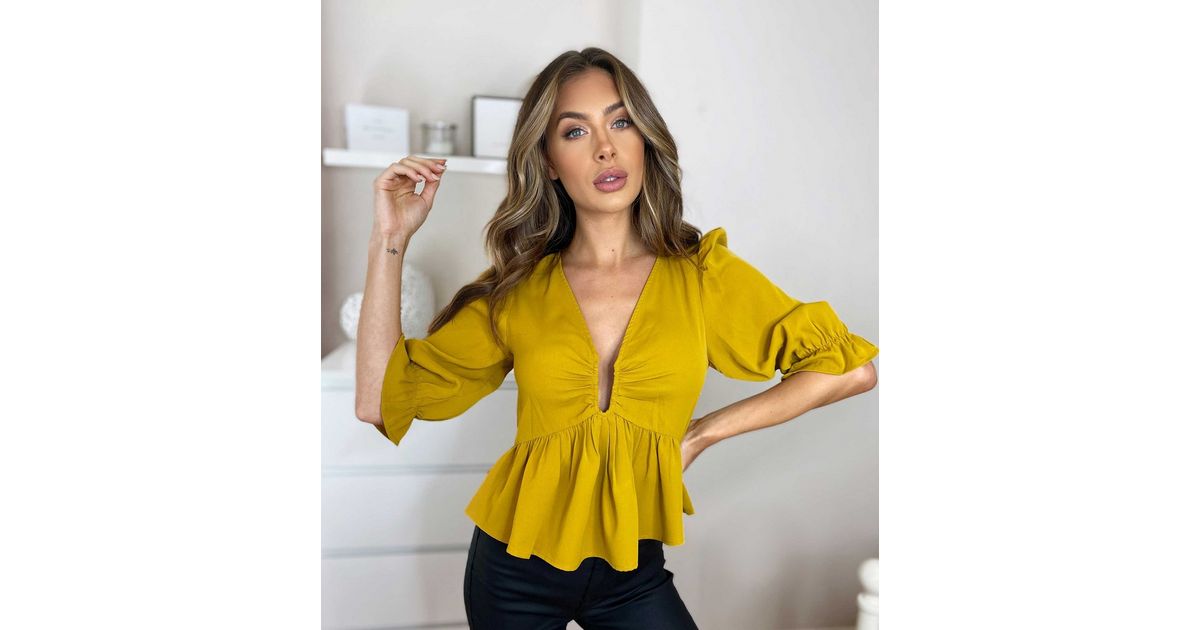 Urban Bliss Yellow Wired Plunge Neck Peplum Top | New Look