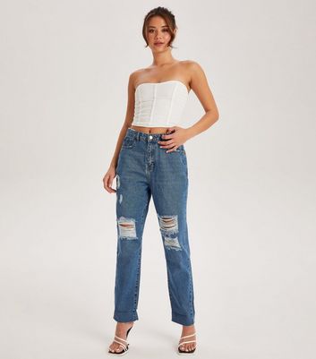 blue ripped mum jeans