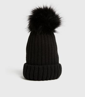 black hat with fur bobble