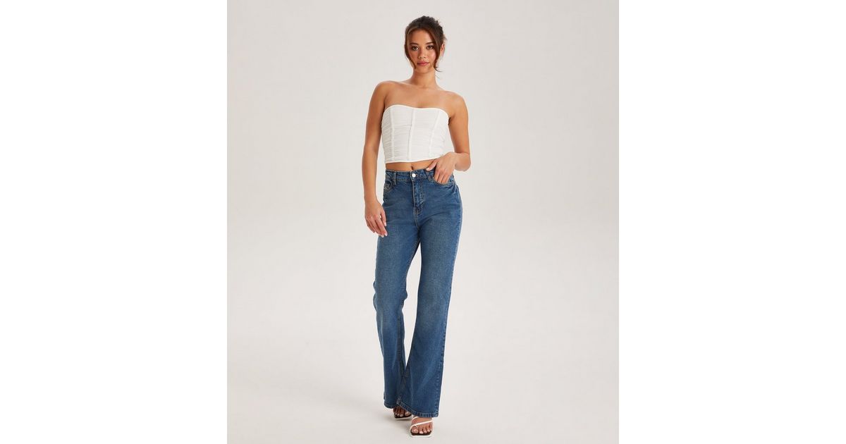 Urban Rinse Urban Bliss Blue Rinse Wash Flared Jeans | New Look