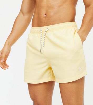 light yellow swim trunks