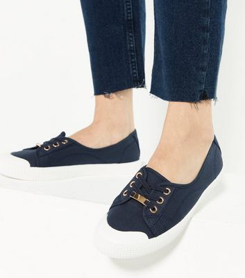 navy canvas trainers