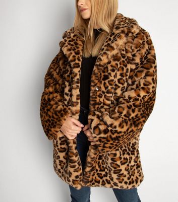 brown fur jacket with hood