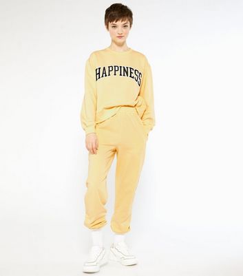 pale yellow sweatpants