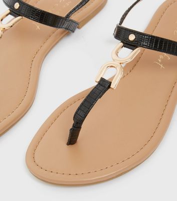 Click to view product details and reviews for Black Chain Trim Strappy Flat Sandals New Look Vegan.