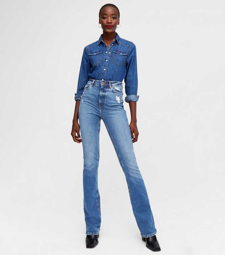 https://media3.newlookassets.com/i/newlook/678306040/womens/clothing/jeans/tall-blue-distressed-high-waist-brooke-flared-jeans.jpg?strip=true&qlt=50&w=720