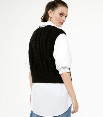 black knitted sweater vest