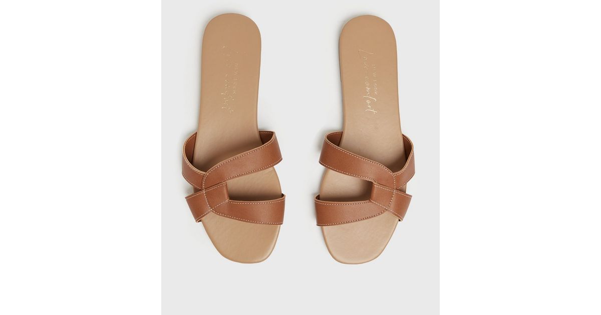 tan cross over slides