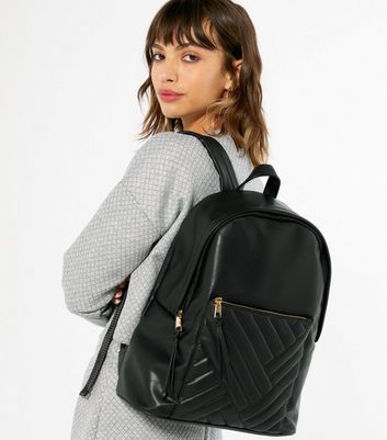 Black leather quilted backpack hot sale