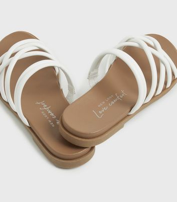Click to view product details and reviews for White Tube Strap Footbed Sliders New Look Vegan.
