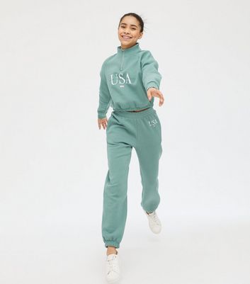 green cuffed joggers
