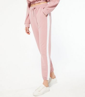 Pink joggers cheap with white stripe