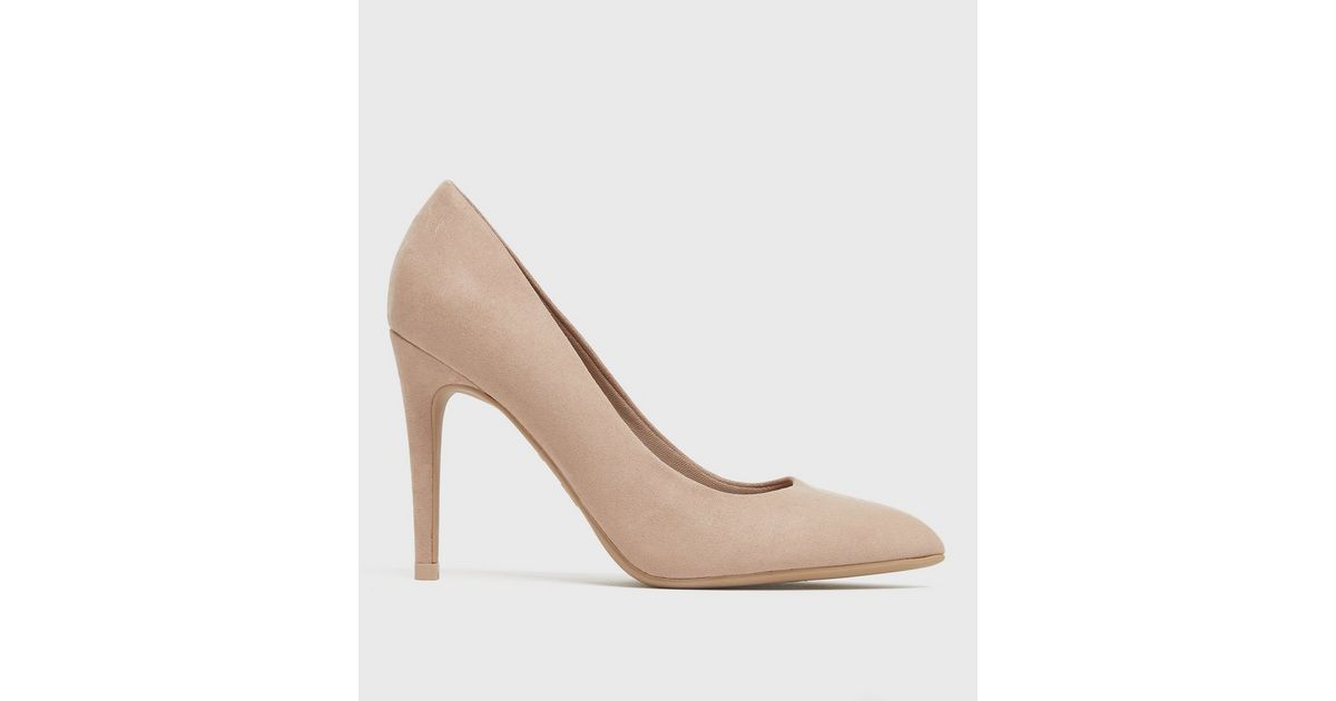 cream pointed stilettos