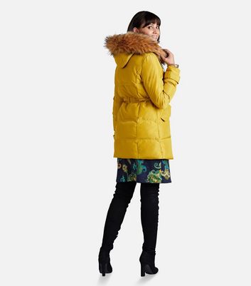 women's yellow coat with fur hood