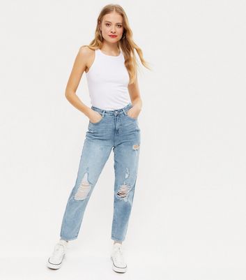 Blue jeans with sales rips