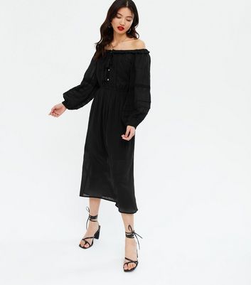 black midi puff sleeve dress