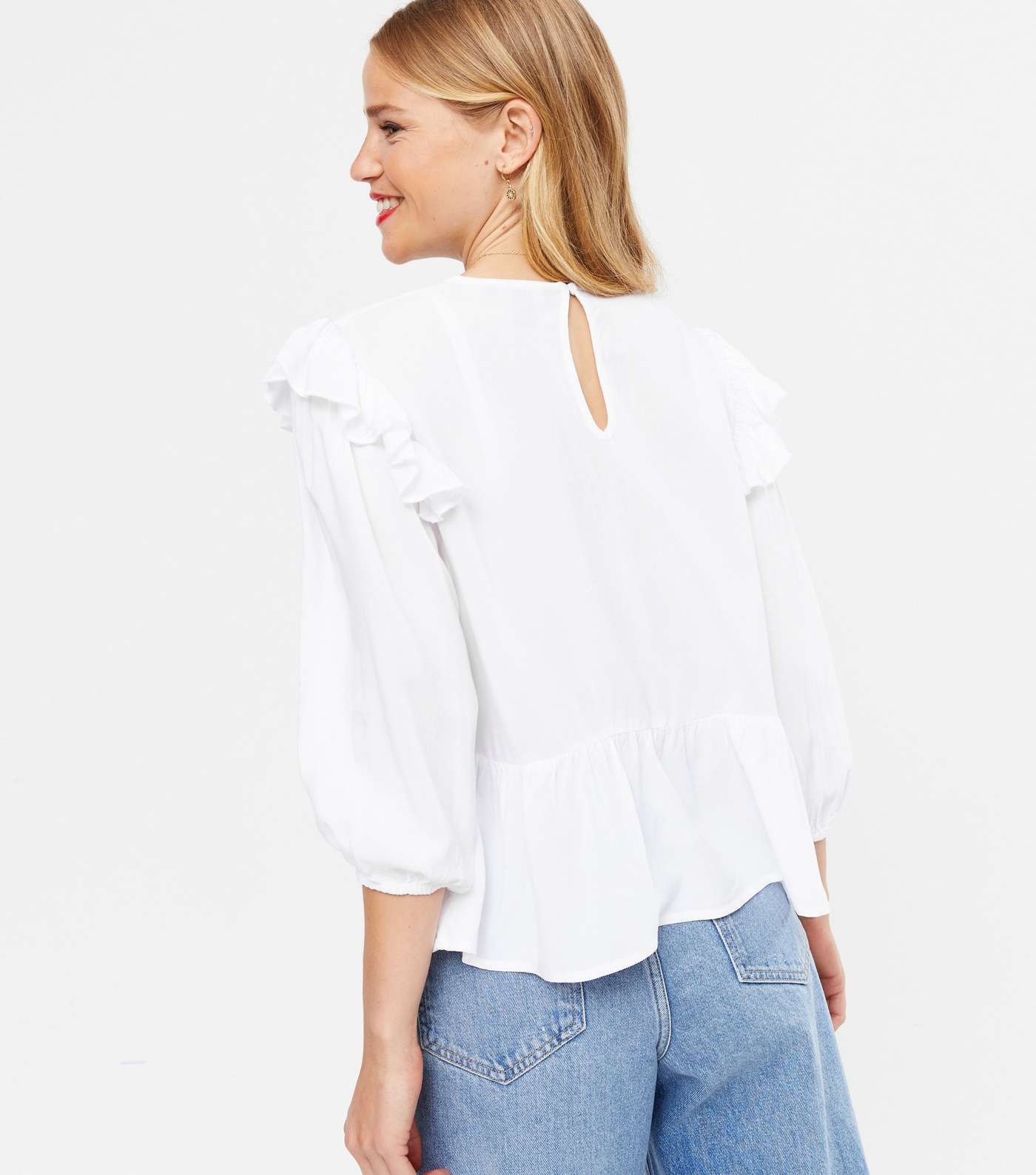 Off White Floral Embroidered Frill Peplum Blouse  Image 4