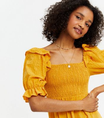 shirred ruffle dress
