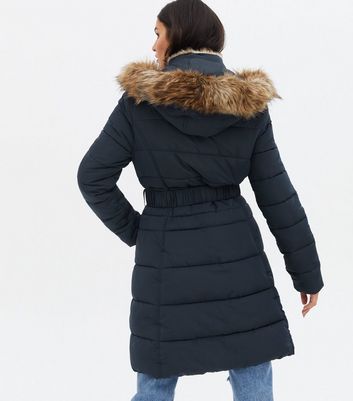 full length belted puffer with faux fur trim