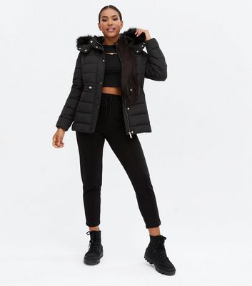 Click to view product details and reviews for Black Faux Fur Hooded Puffer Jacket New Look.