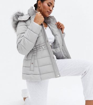 Click to view product details and reviews for Pale Grey Faux Fur Hooded Puffer Jacket New Look.