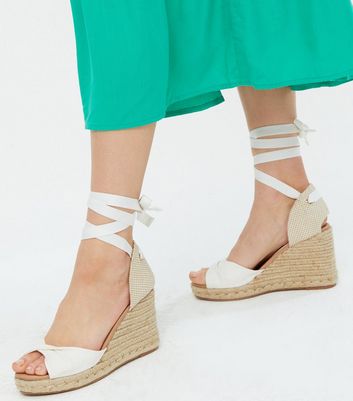 white wedges with ribbon tie