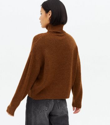 rust coloured polo neck jumper