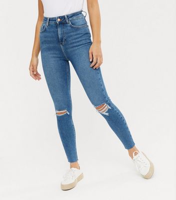 blue ripped super skinny jeans