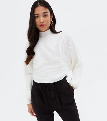 white high neck jumper