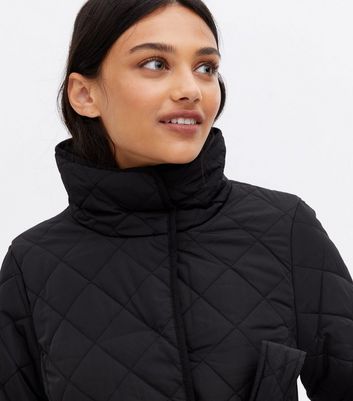 black quilted belted jacket