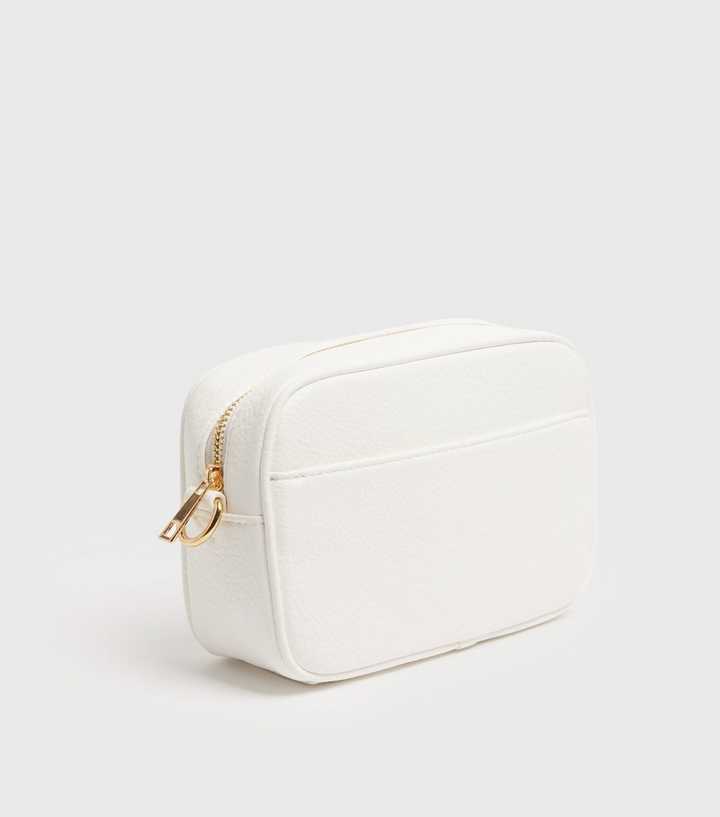 ASOS DESIGN faux leather croc crossbody camera bag in off white