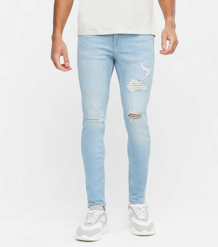 https://media3.newlookassets.com/i/newlook/686984844M1/mens/clothing/jeans/bright-blue-extreme-rip-skinny-jeans.jpg?strip=true&qlt=50&w=720