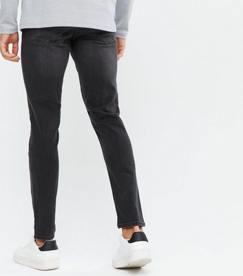 black frayed bottom skinny jeans