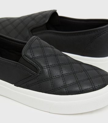 Black quilted deals slip on vans