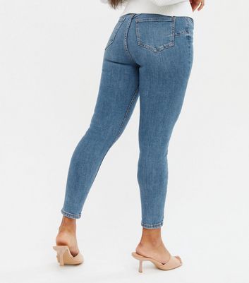 Click to view product details and reviews for Petite Blue Cropped Lift Shape Jenna Skinny Jeans New Look.