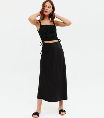 Click to view product details and reviews for Black Ribbed Ruched Side Cami New Look.