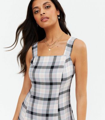 white check ruffle pinafore mini dress