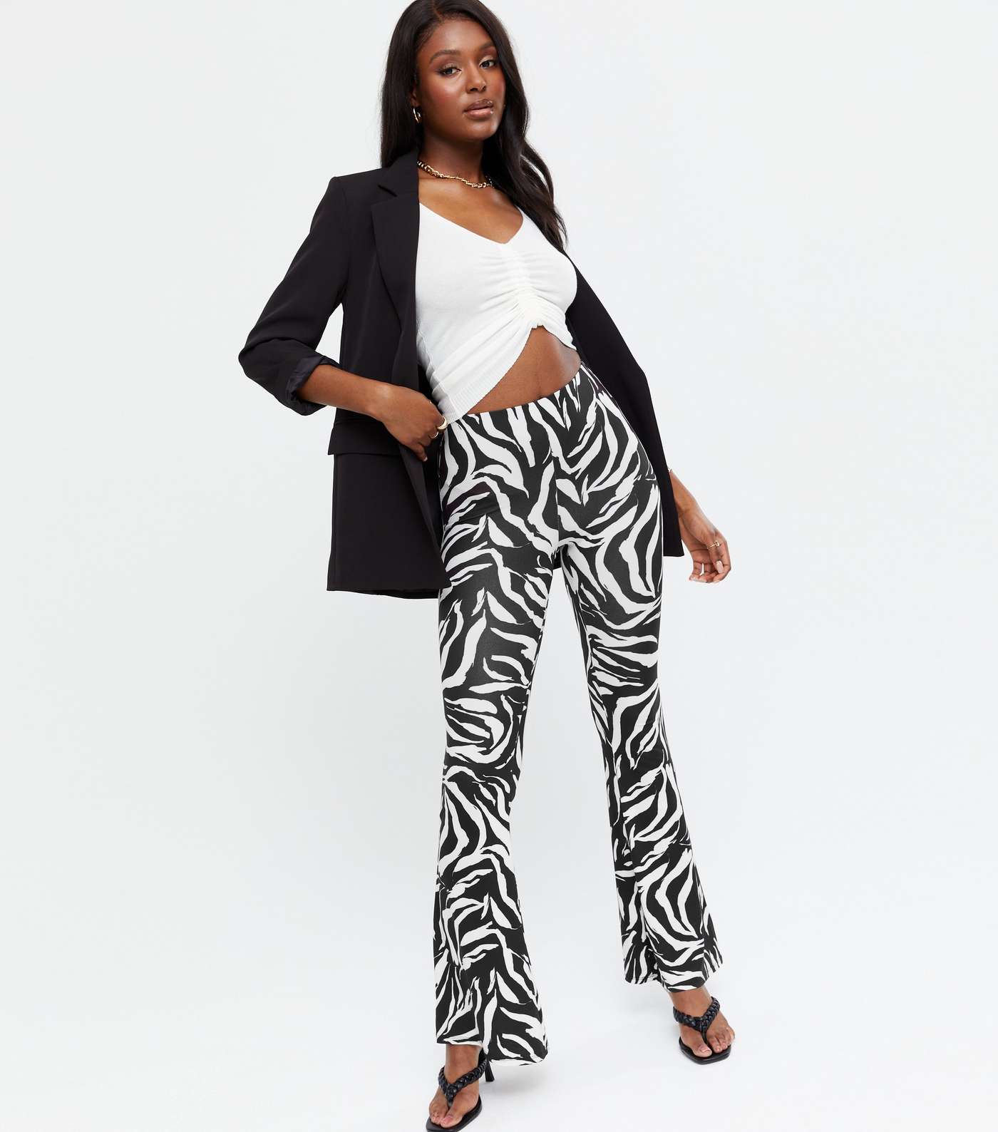 Black Zebra Print Flared Trousers